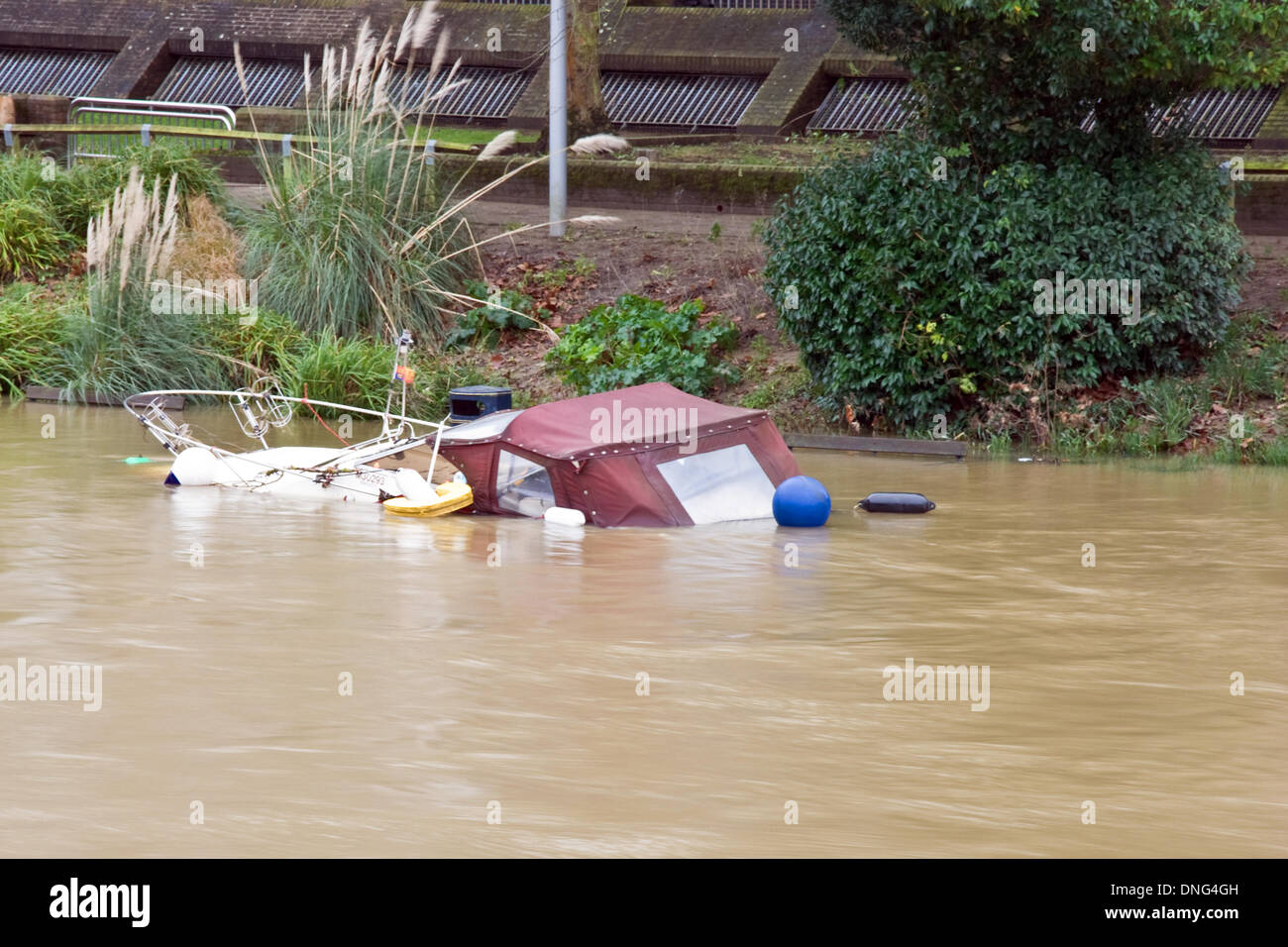Floods cause boat to sink Stock Photo Alamy