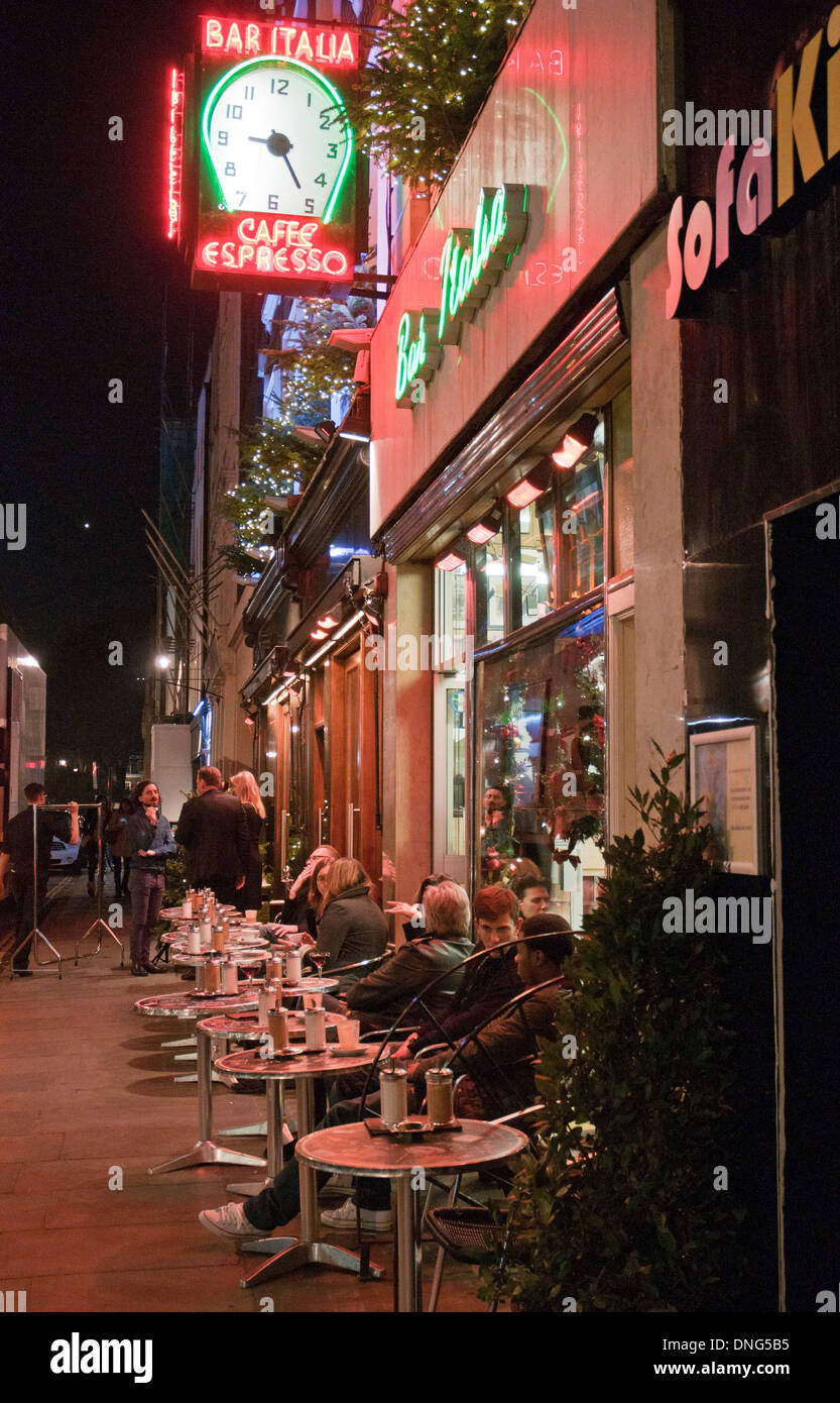People drink outside in Bar Italia terrace at night, Soho, London, United Kingdom Stock Photo