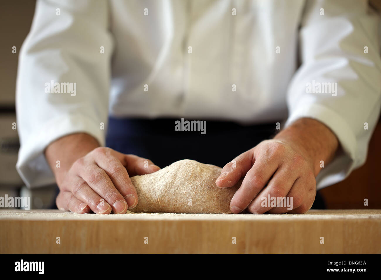 Chef kneading yeast dough Stock Photo Alamy