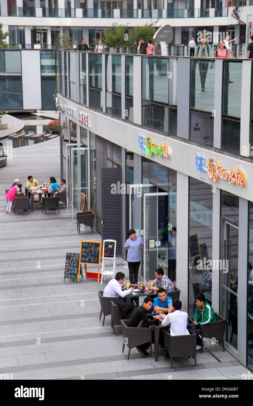 Beijing China,Chinese,Chaoyang District,Sanlitun Village,South North Piazza Deck,shopping shopper shoppers shop shops market markets marketplace buyin Stock Photo