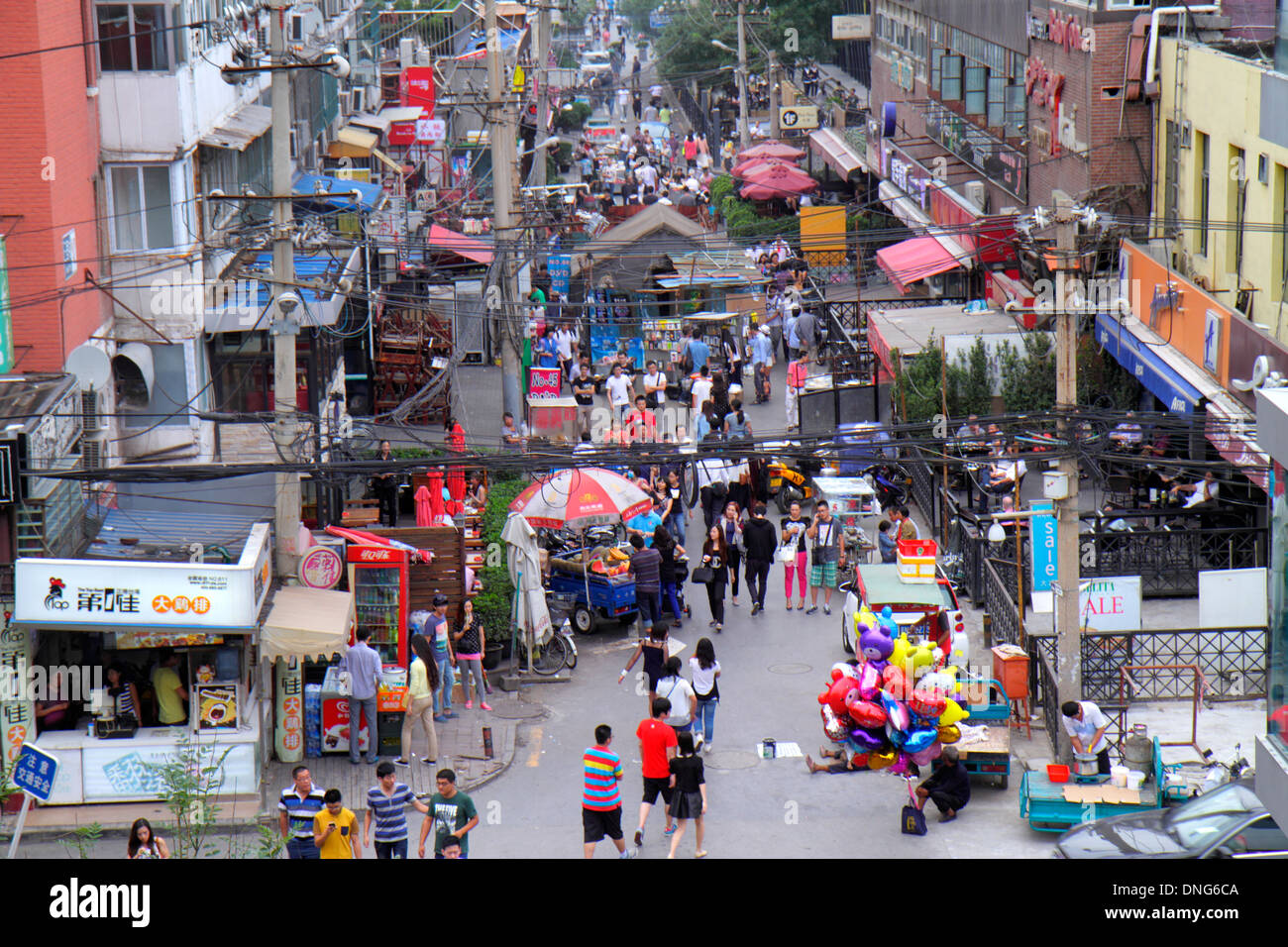 Beijing China,Chinese,Chaoyang District,Sanlitun Village,overhead view,aerial overhead view from above,marketplace,streetstall,stalls,booth,booths,ven Stock Photo