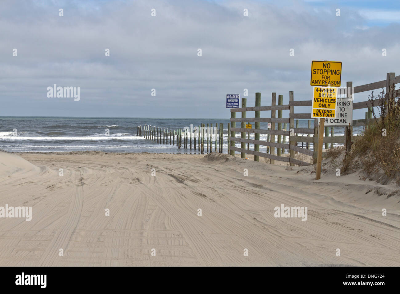 Beach signs and blockades concerning driving on the beach in the Outer
