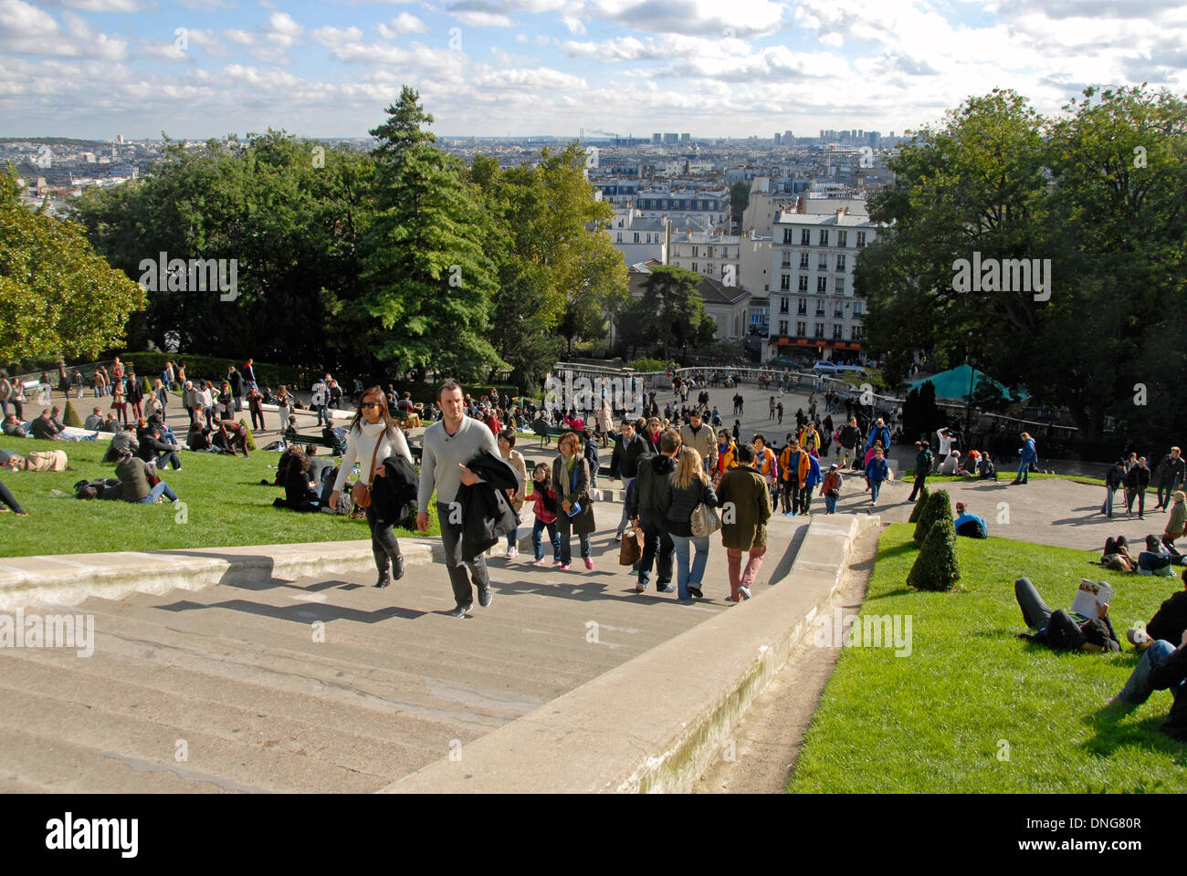 Crowds of people climbing the steps to Sacre Coeur basilica, Paris, France Stock Photo