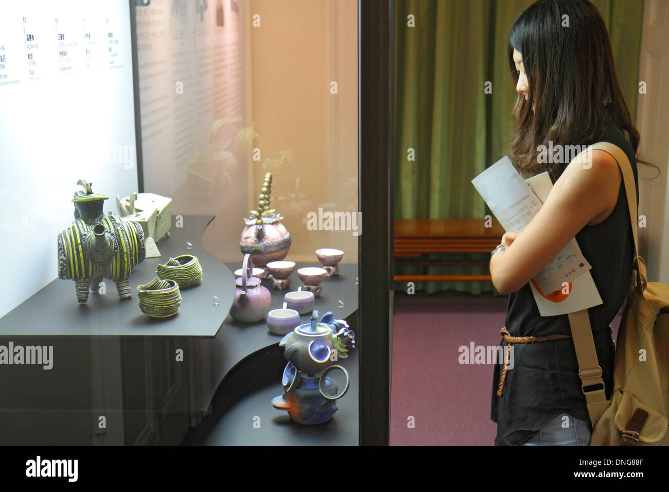 Hong Kong China,HK,Asia,Chinese,Oriental,Island,Central,Hong Kong Park,Flagstaff House Museum Of Tea Ware,Asian adult,adults,woman female women,lookin Stock Photo