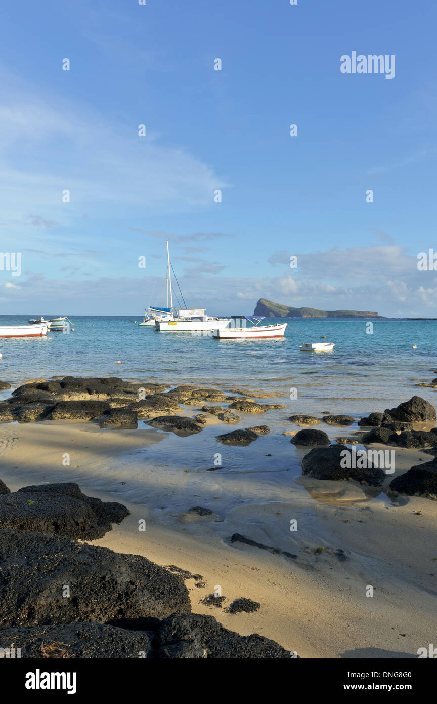 Scenic view of Coin de Mire island and fishing boats, Mauritius Stock ...