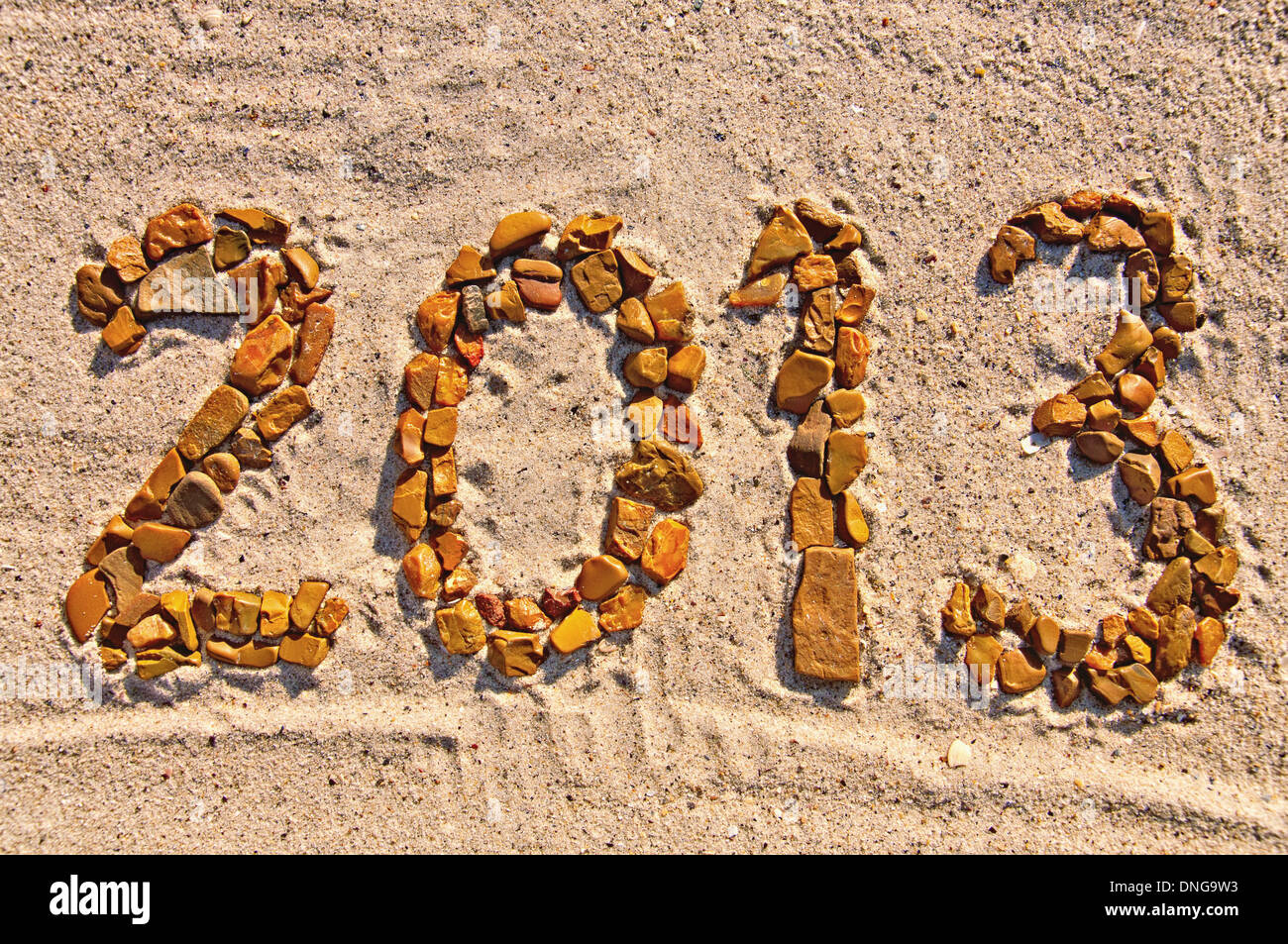 Figures, stonework on the sand-2013 Stock Photo