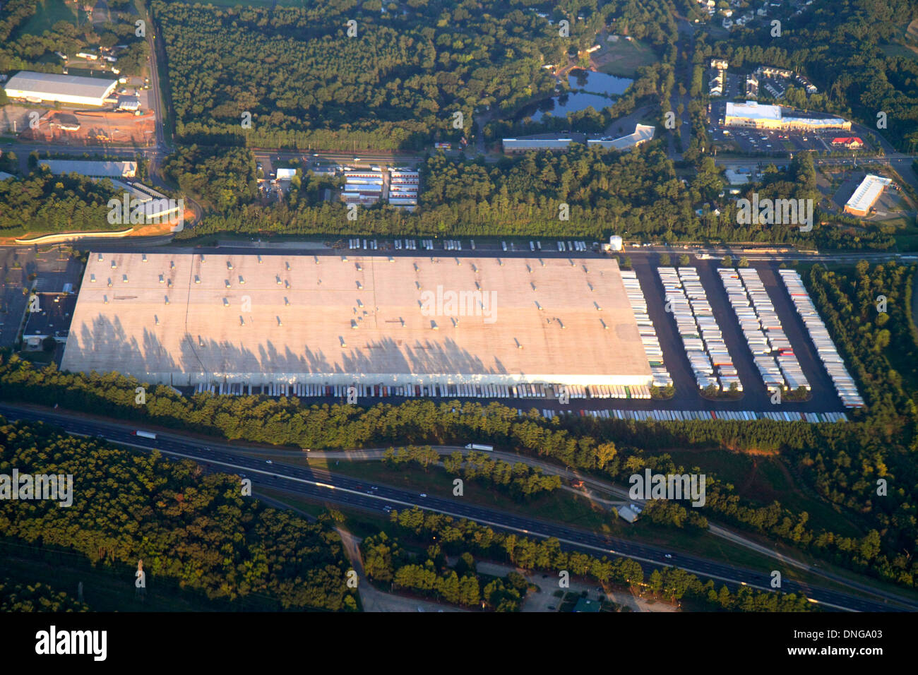 Charlotte North Carolina,inflight,passenger cabin,inflight,US Airways,from Miami,window seat view,large warehouse,aerial overhead view from above,Ross Stock Photo