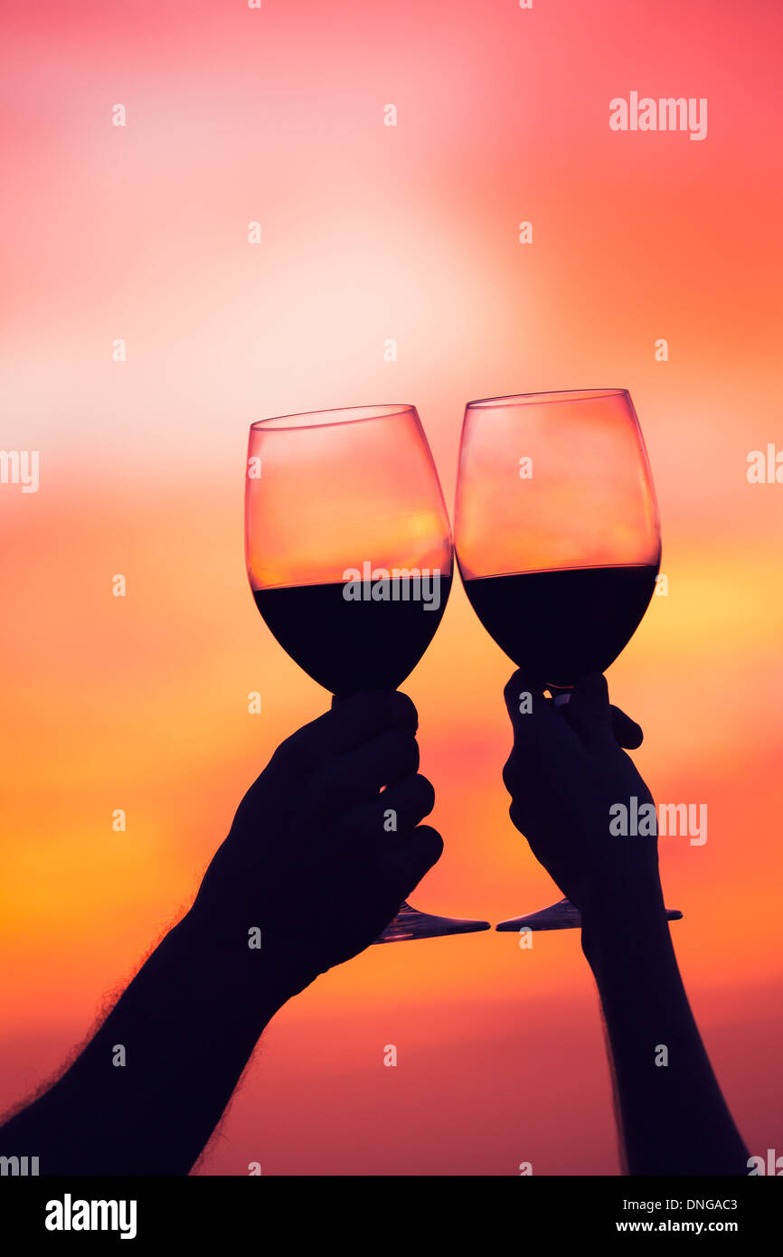 Silhouette couple drinking wine sunset hi-res stock photography and ...