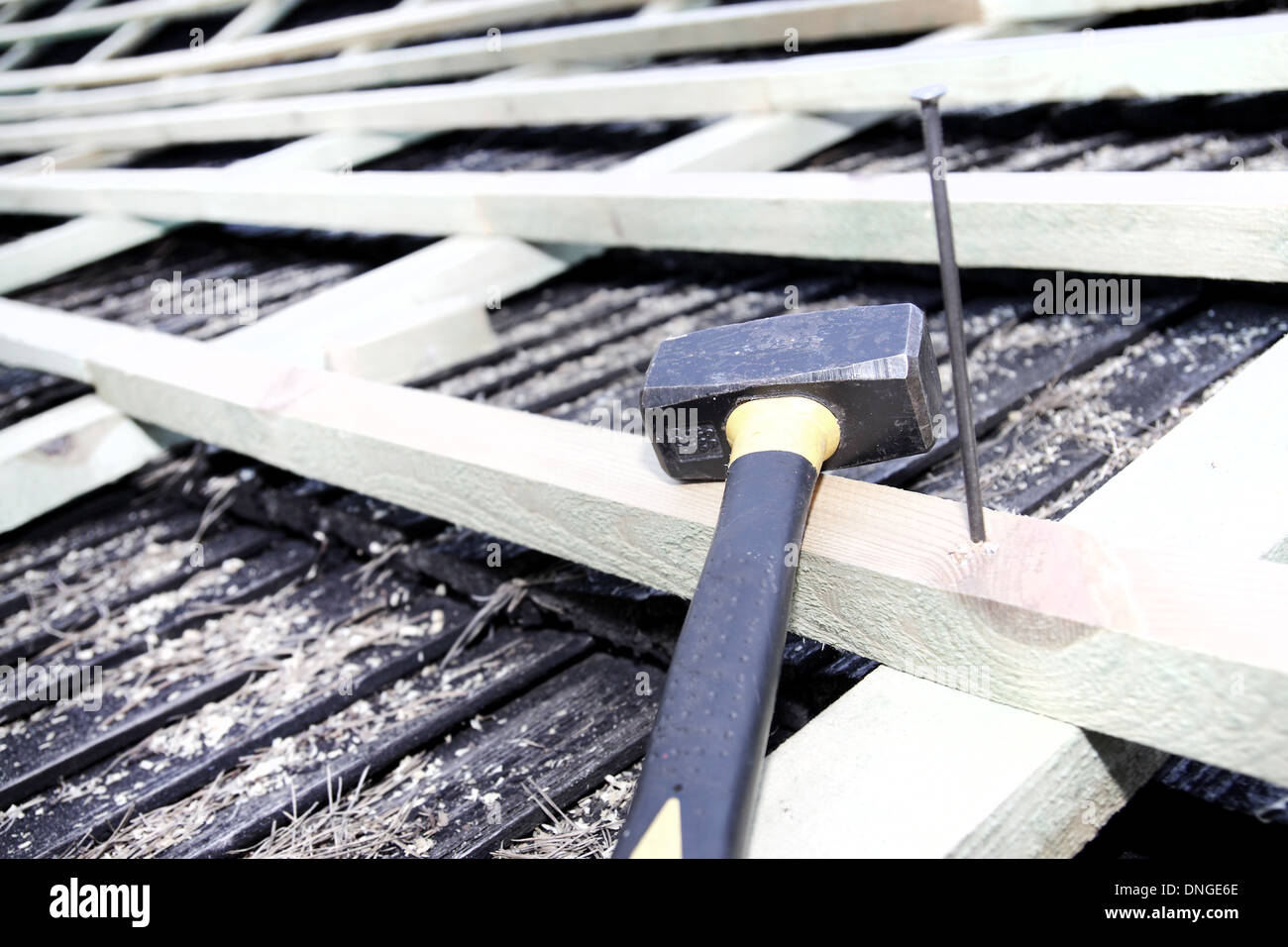 Laying sheets on the roof Stock Photo