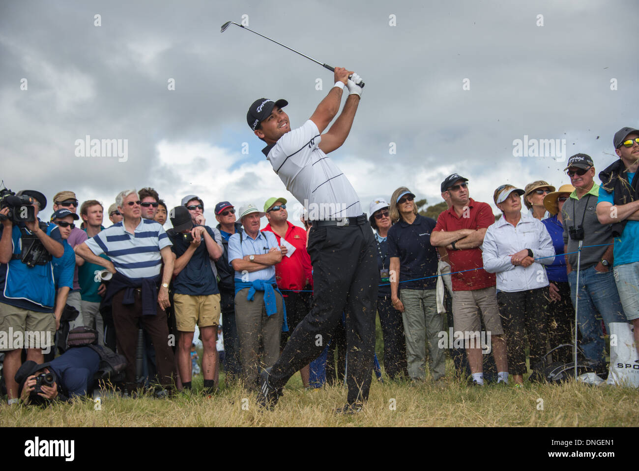 Jason Day world Champion golfer Australia playing in the Handa World Cup 2013 Royal Melbourne portrait with spectators looking Stock Photo