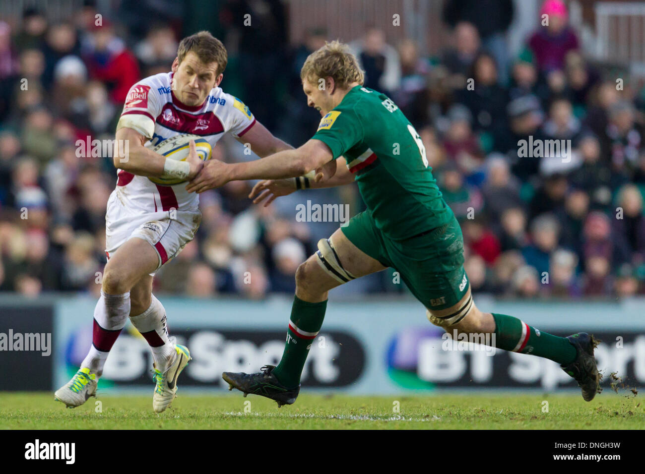 Leicester, UK. 28th Dec, 2013. Mark CUETO (Sale Sharks) beats Jamie GIBSON (Leicester Tigers) during the Aviva Premiership game between Leicester Tigers and Sale Sharks from Welford Road. Credit:  Action Plus Sports/Alamy Live News Stock Photo