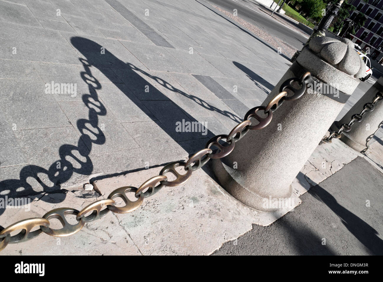 Chain and bollard, protected area Stock Photo - Alamy