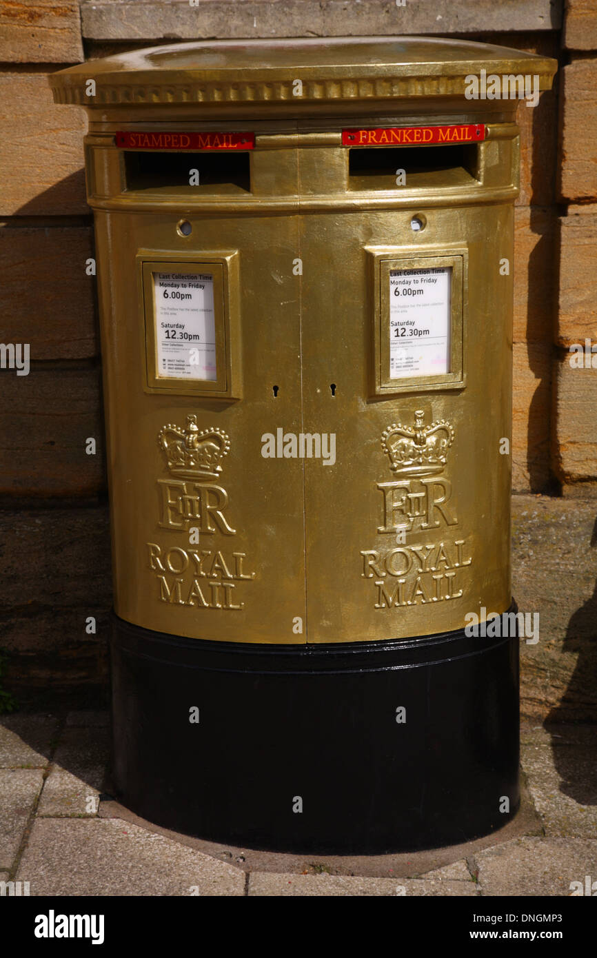 Gold letter box commemorating London 2012 gold medal winner Peter Wilson double trap shooting, Cheap St, Sherborne, Dorset, UK Stock Photo