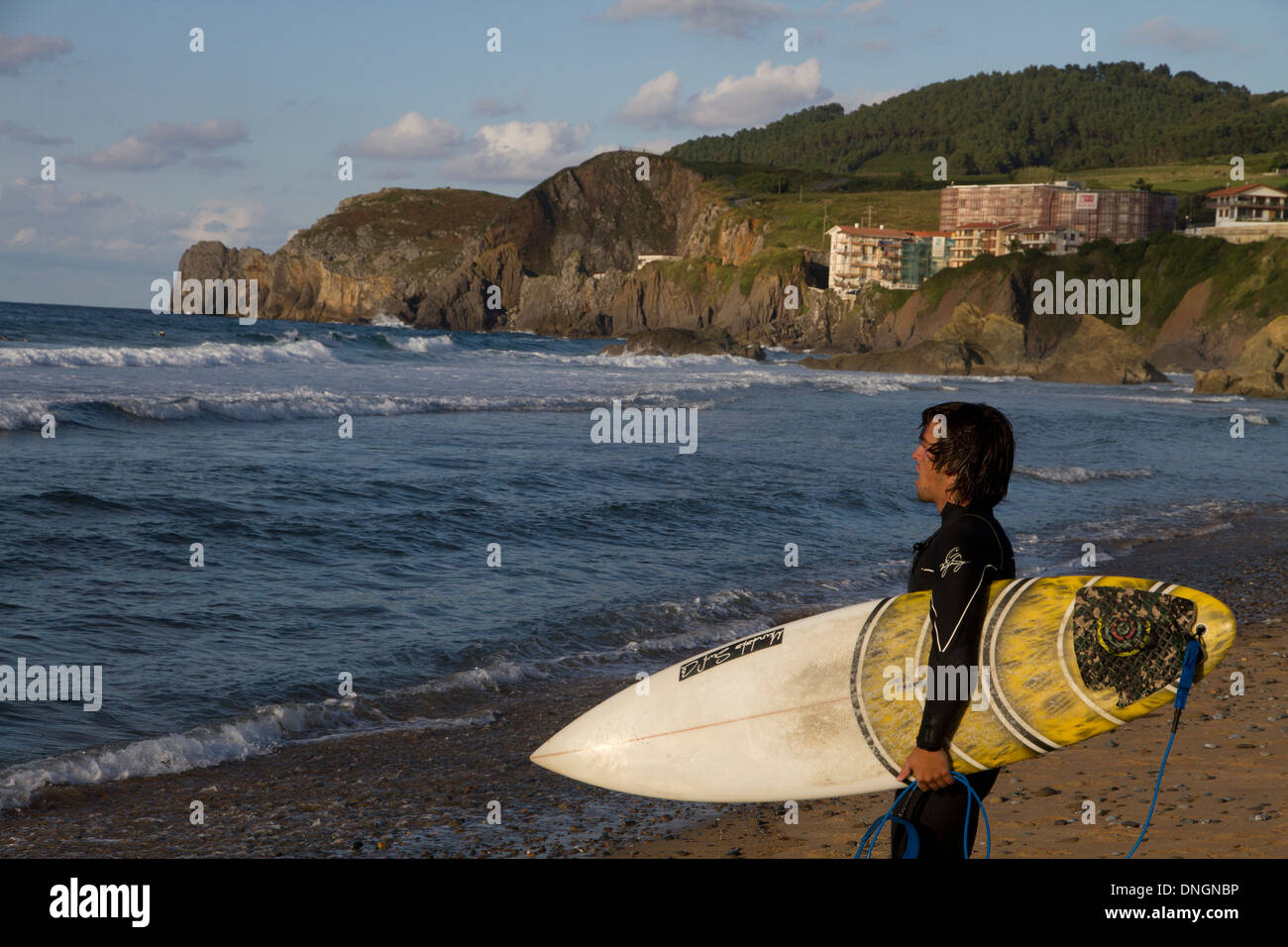 Surfer ocean Mar Cantábrico Cantabrian Sea beach Spain Stock Photo