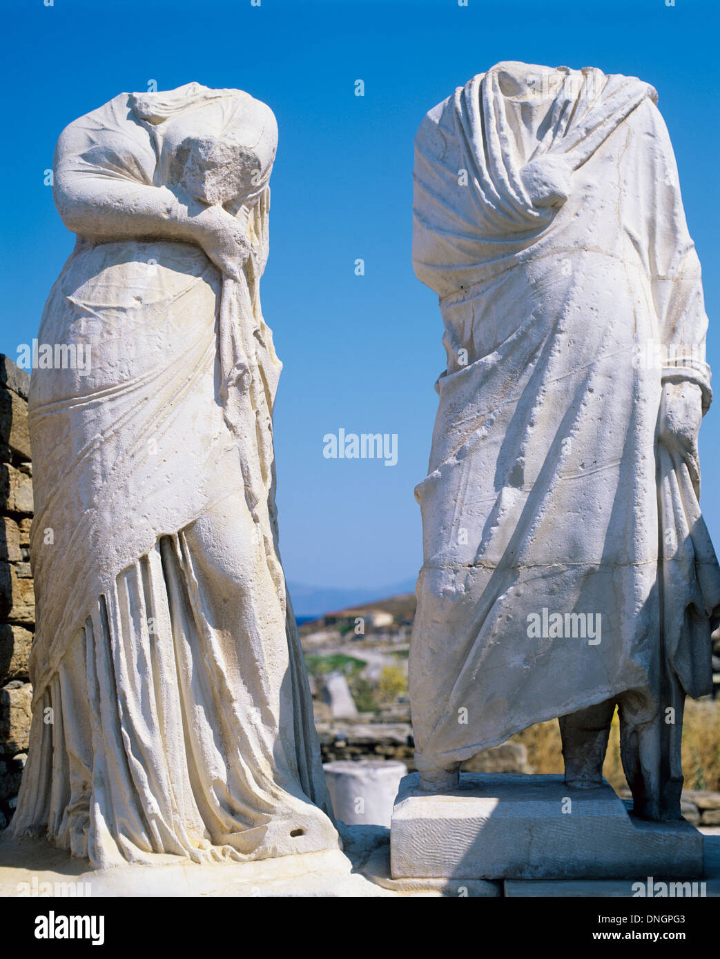 Headless statues of Cleopatra and Dioscurides at the House of Cleopatra, Delos, Greece Stock Photo