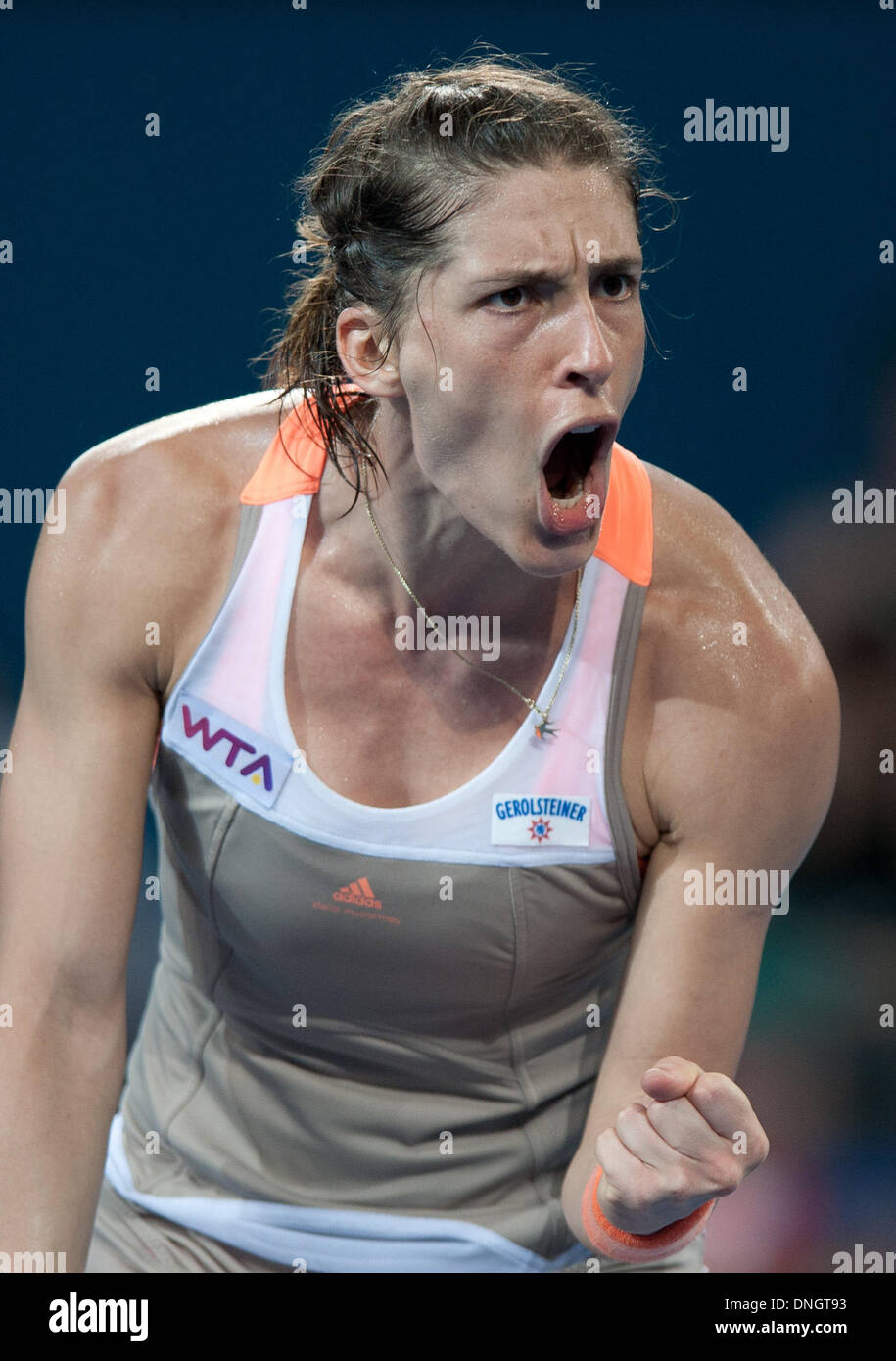 Brisbane, Australia. 29th Dec, 2013. Andrea Petkovic of Germany reacts during her women's singles first round match against Bethanie Mattek-Sands of the U.S. at Brisbane International Tennis Tournament in Brisbane, Australia, Dec. 29, 2013. Petkovic won 2-0. Credit:  Bai Xue/Xinhua/Alamy Live News Stock Photo