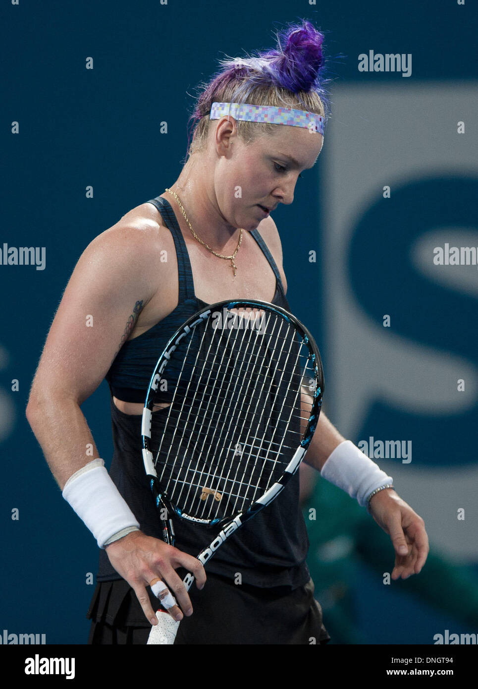 Brisbane, Australia. 29th Dec, 2013. Bethanie Mattek-Sands of the U.S. reacts during her women's singles first round match against Andrea Petkovic of Germany at Brisbane International Tennis Tournament in Brisbane, Australia, Dec. 29, 2013. Petkovic won 2-0. Credit:  Bai Xue/Xinhua/Alamy Live News Stock Photo