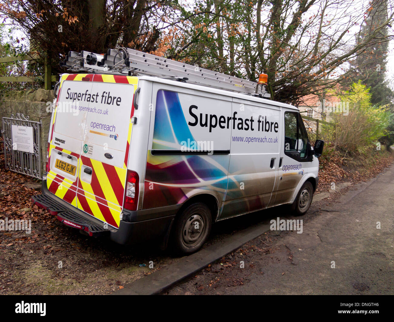 Superfast Fibre caption on a BT work van installing high speed broadband in a small rural village in North Yorkshire England Stock Photo