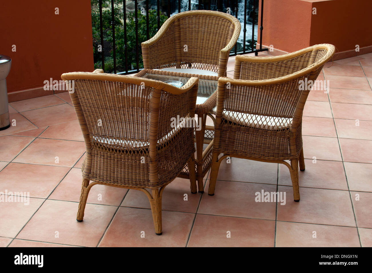 Cane seats and table, Sheraton Hotel, Caleta de Fuste, Fuerteventura, Canary Islands, Spain. Stock Photo
