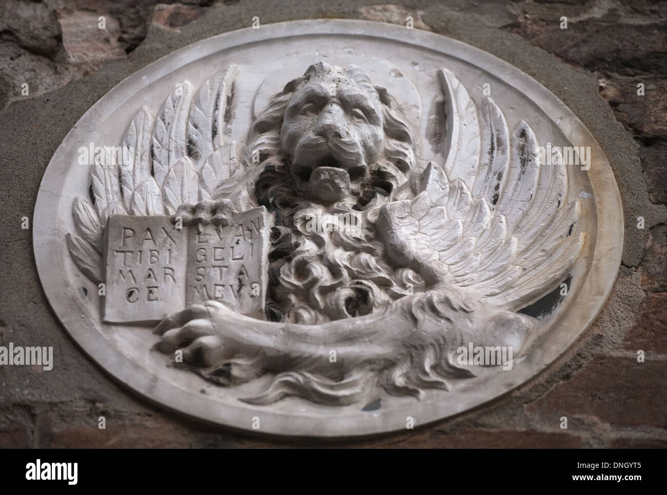 bas-relief of winged lion with the book and Pax tibi Marce, evangelista meus inscription, Venice, Italy Stock Photo