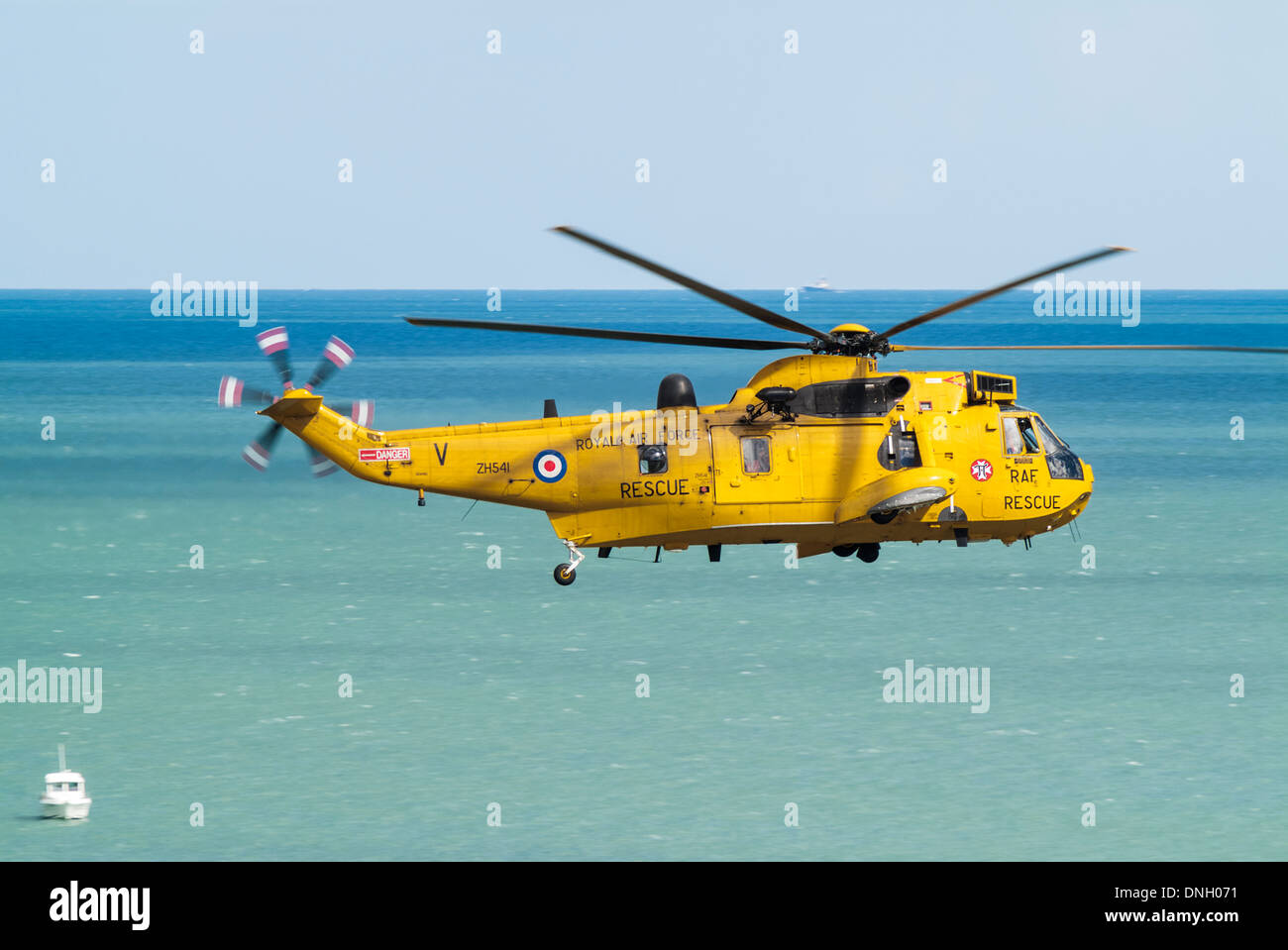 Royal Air Force Search & Rescue Seaking helicopter flying with the sea