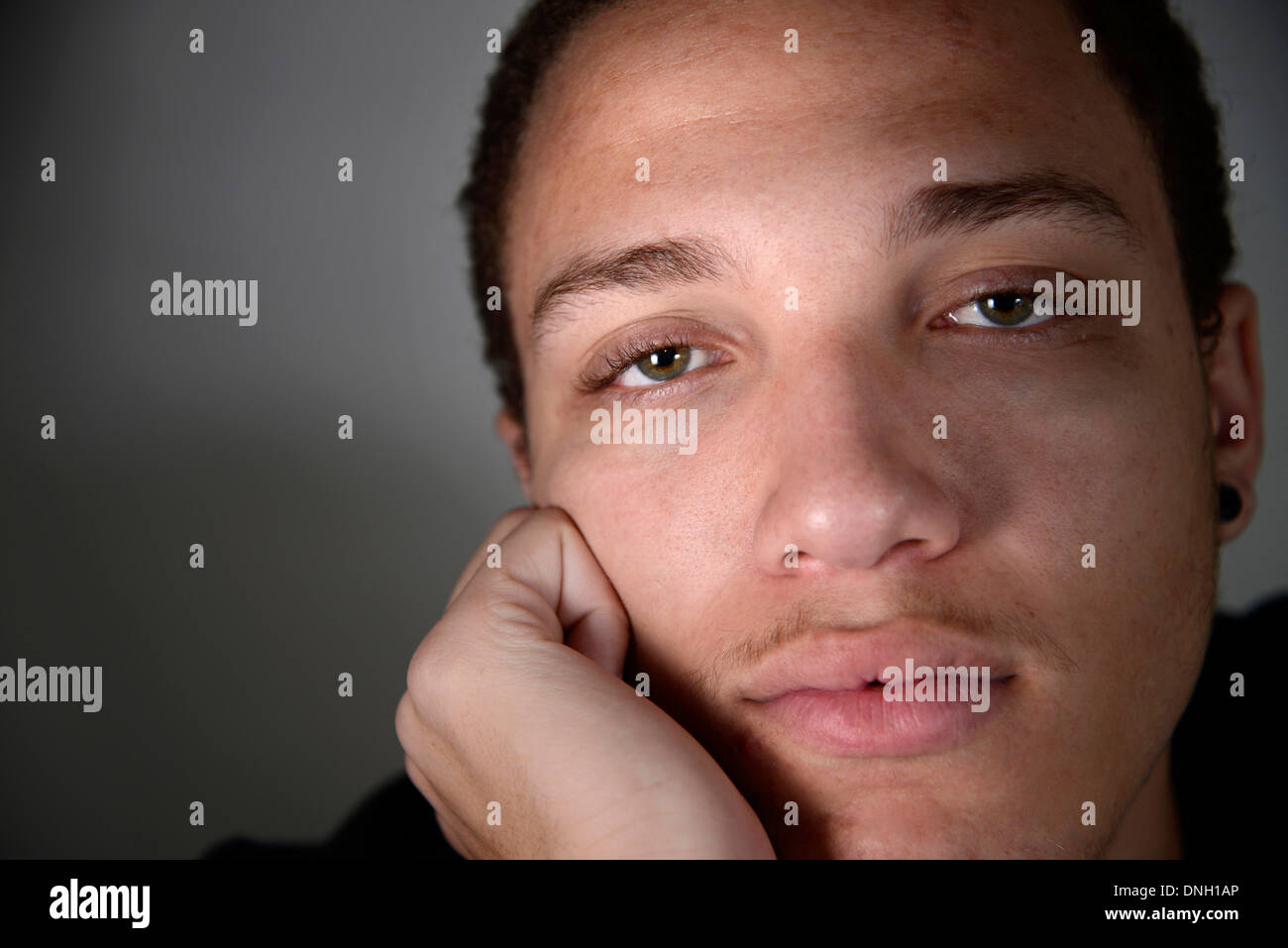 A male teenager and recent graduate. Stock Photo