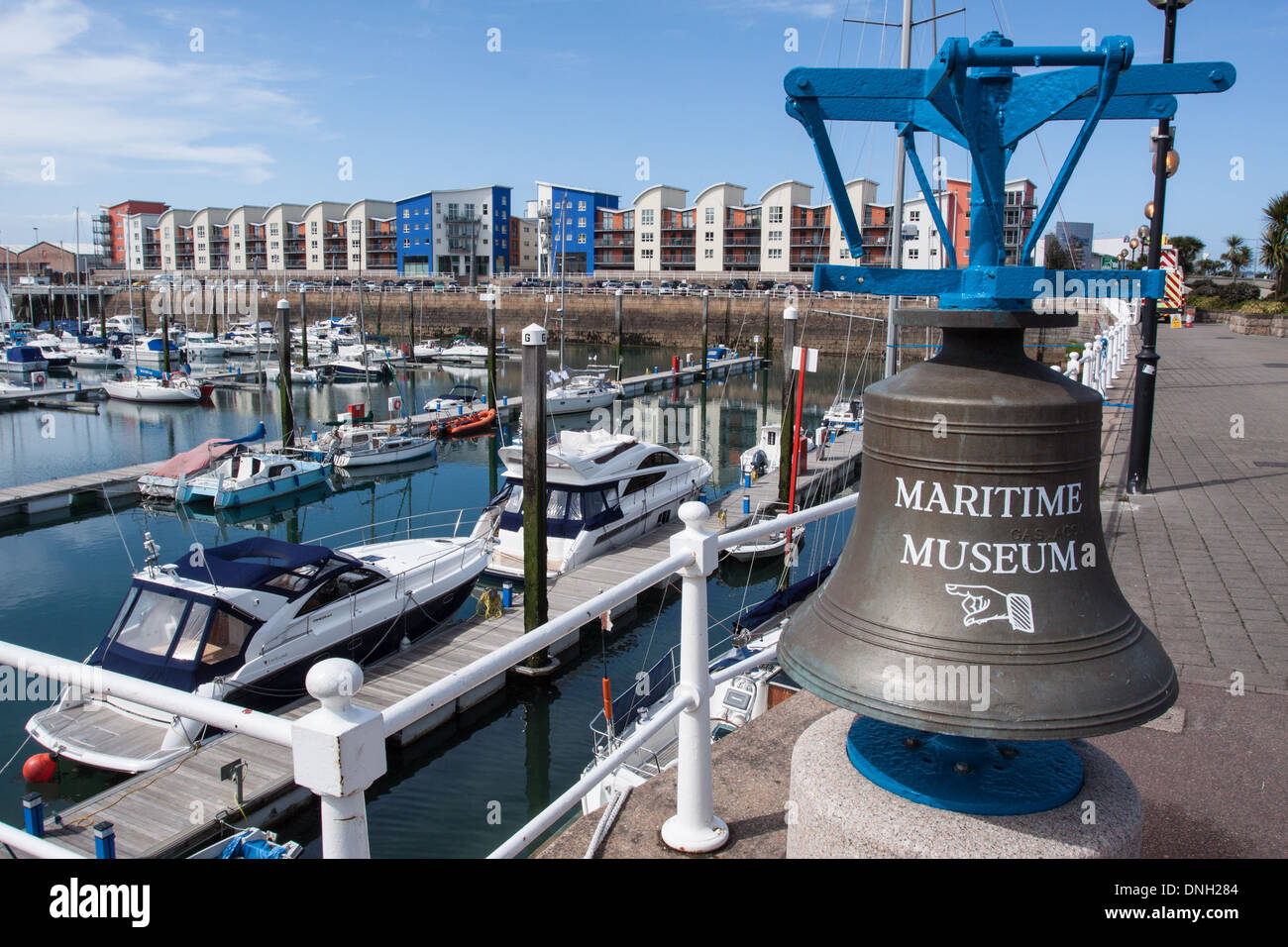 PORT OF SAINT HELIER WITH A SHIP'S BELL POINTING IN THE DIRECTION OF THE  MARITIME MUSEUM, SAINT HELIER, JERSEY, CHANNEL ISLANDS Stock Photo - Alamy