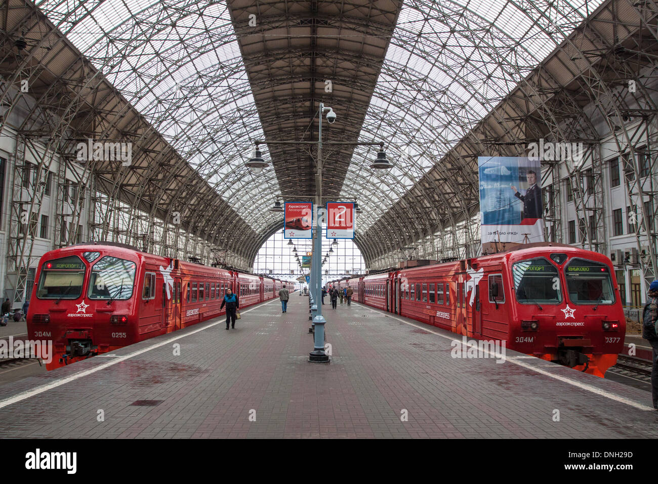 TRAINS AT THE PLATFORM BELOW THE GLASS ROOF OF THE KIEV STATION, MOSCOW, RUSSIA Stock Photo
