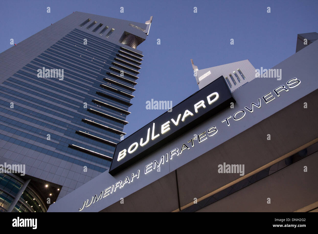 LOWANGLE NIGHT SHOT OF THE EMIRATES TOWERS, FINANCIAL CENTER, DUBAI