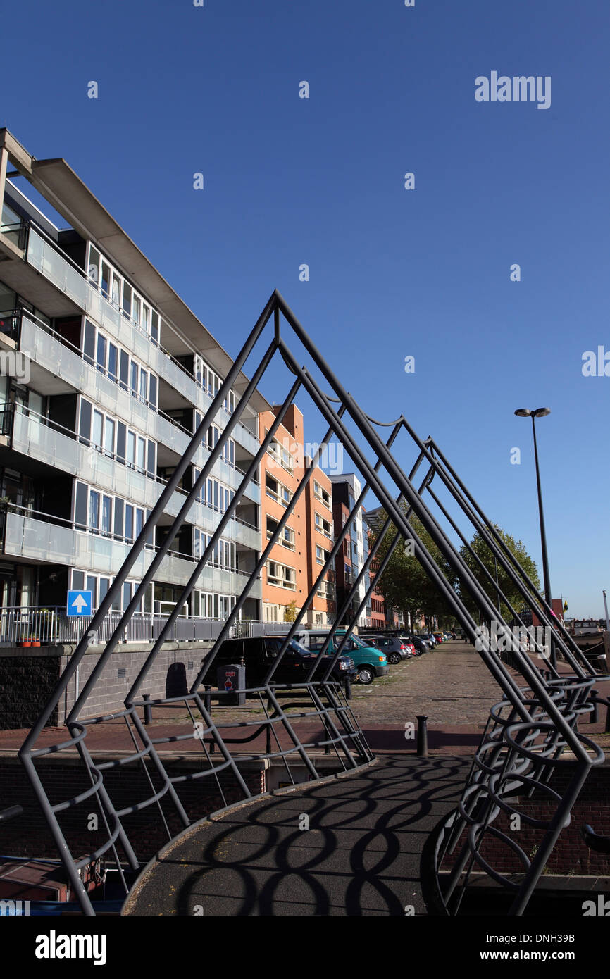 Pedestrian bridge on Java Island (Java Island) in Amsterdam, Netherlands. Stock Photo