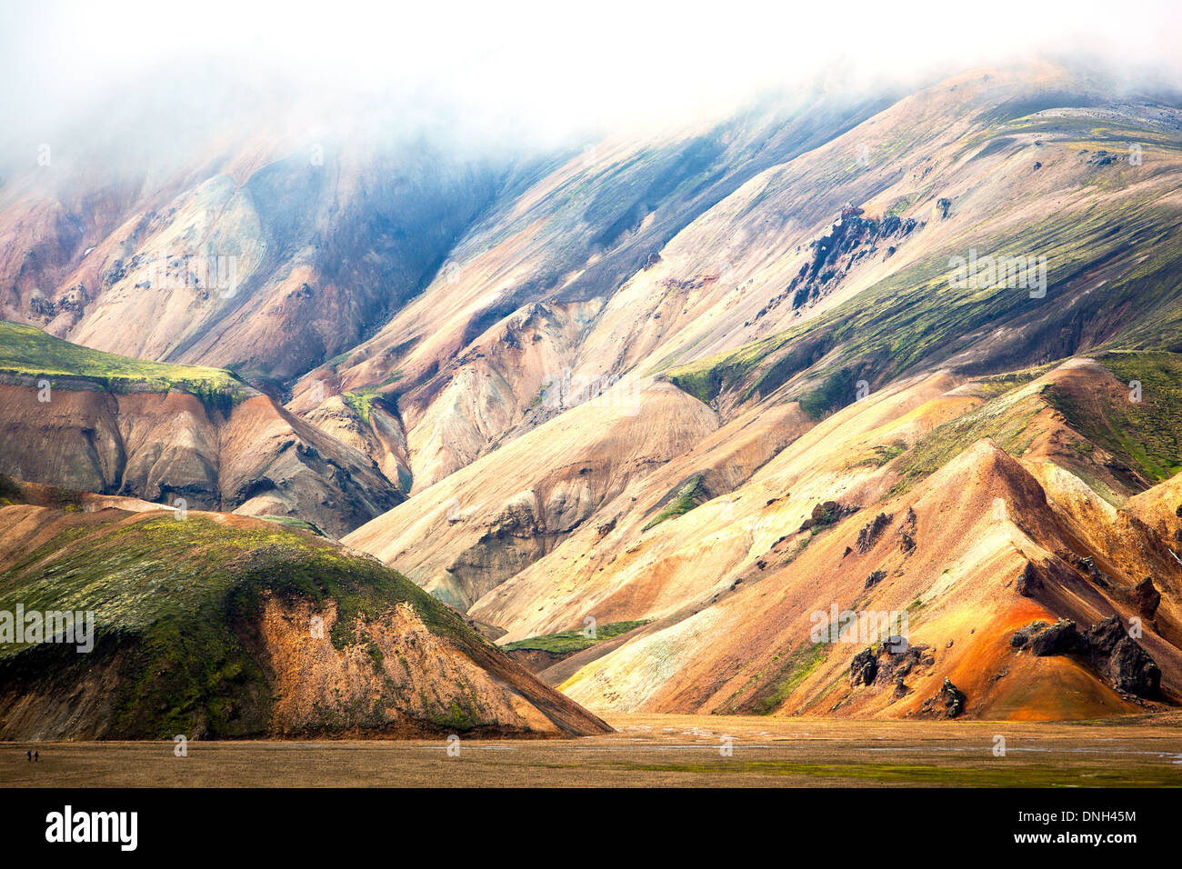 MOUNTAINS OF RHYOLITE IN LANDMANNALAUGAR, VOLCANIC AND GEOTHERMAL ZONE OF WHICH THE NAME LITERALLY MEANS 'HOT BATHS OF THE PEOPLE OF THE LAND', REGION OF THE HIGH PLATEAUS, SOUTHERN ICELAND, EUROPE Stock Photo