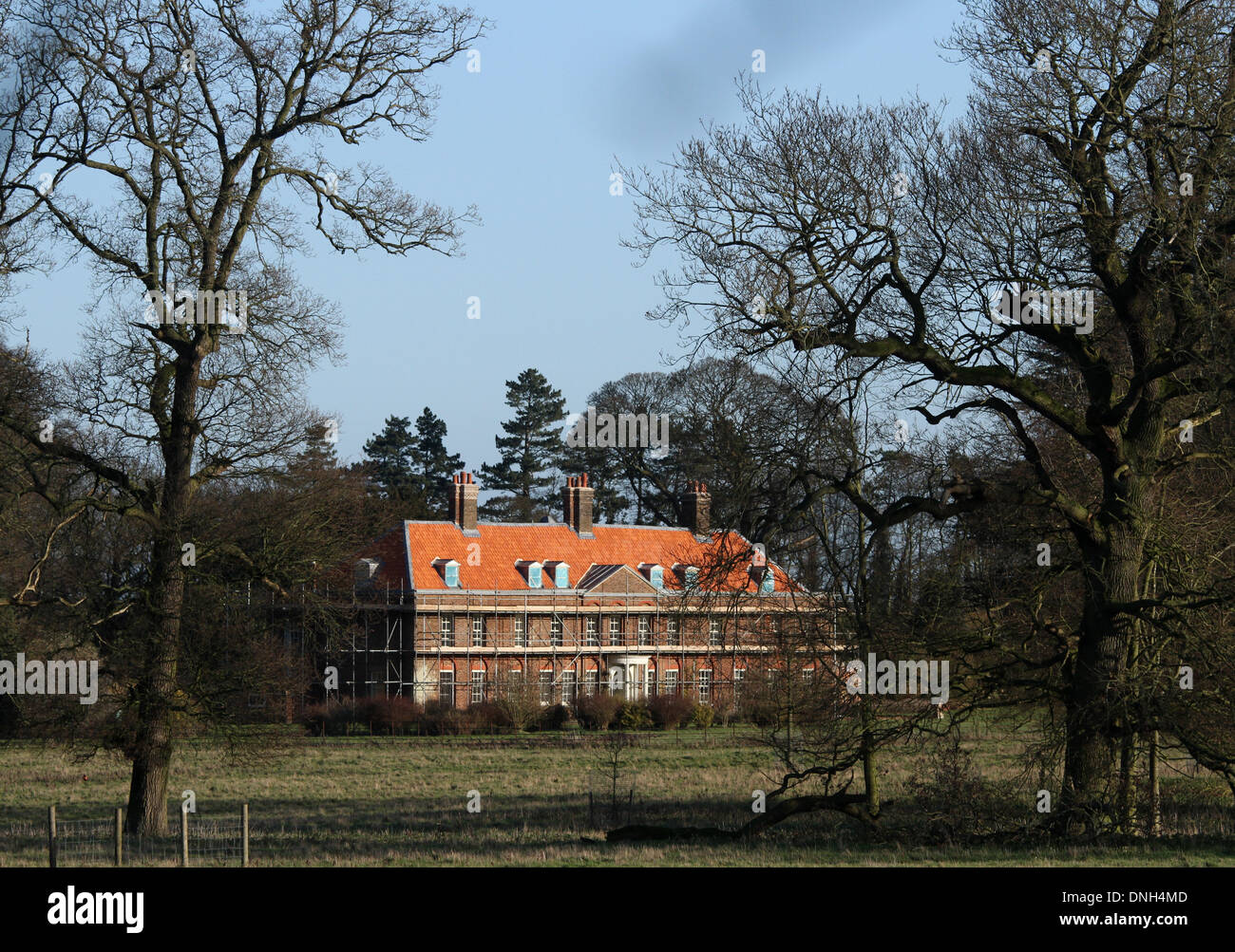 Anmer Hall - Kate and William home in Norfolk . . Anmer, Nortfolk . . 29.12.13 The roof tiles of Anmer Hall have now been replaced as renovation and improvement works continue, before The Duke and Duchess of Cambridge move in. The new tiles have been lambasted by some people thinking the Hall now resembles a Barratt home. Anmer Hall in Norfolk, is the home given to the Duke and Duchess of Cambridge, Prince William and Kate, as a gift from her Majesty The Queen Elizabeth, to use as a country home for them to share. Anmer Hall is a late Georgian country house which sits in the grounds of the San Stock Photo