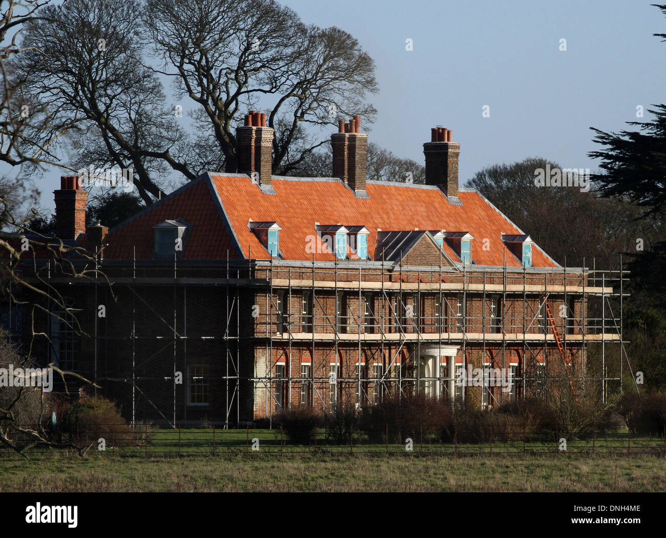 Anmer Hall - Kate and William home in Norfolk . . Anmer, Nortfolk . . 29.12.13 The roof tiles of Anmer Hall have now been replaced as renovation and improvement works continue, before The Duke and Duchess of Cambridge move in. The new tiles have been lambasted by some people thinking the Hall now resembles a Barratt home. Anmer Hall in Norfolk, is the home given to the Duke and Duchess of Cambridge, Prince William and Kate, as a gift from her Majesty The Queen Elizabeth, to use as a country home for them to share. Anmer Hall is a late Georgian country house which sits in the grounds of the San Stock Photo
