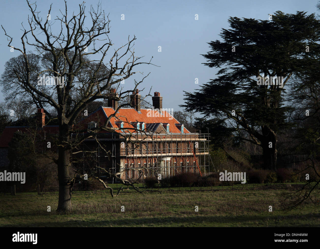 Anmer Hall - Kate and William home in Norfolk . . Anmer, Nortfolk . . 29.12.13 The roof tiles of Anmer Hall have now been replaced as renovation and improvement works continue, before The Duke and Duchess of Cambridge move in. The new tiles have been lambasted by some people thinking the Hall now resembles a Barratt home. Anmer Hall in Norfolk, is the home given to the Duke and Duchess of Cambridge, Prince William and Kate, as a gift from her Majesty The Queen Elizabeth, to use as a country home for them to share. Anmer Hall is a late Georgian country house which sits in the grounds of the San Stock Photo