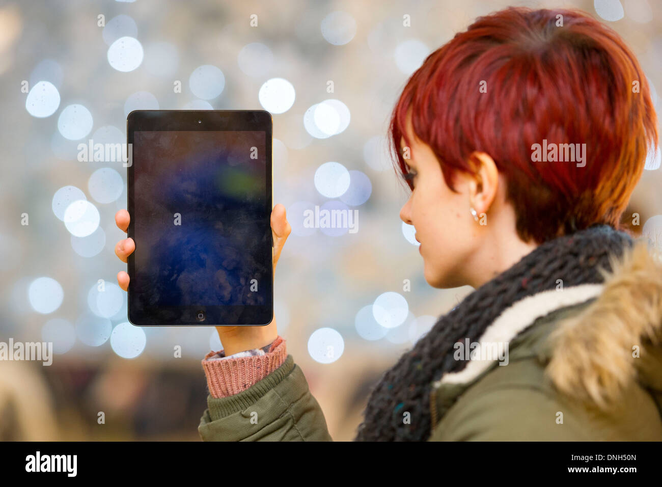 A girl holds an iPad. Stock Photo