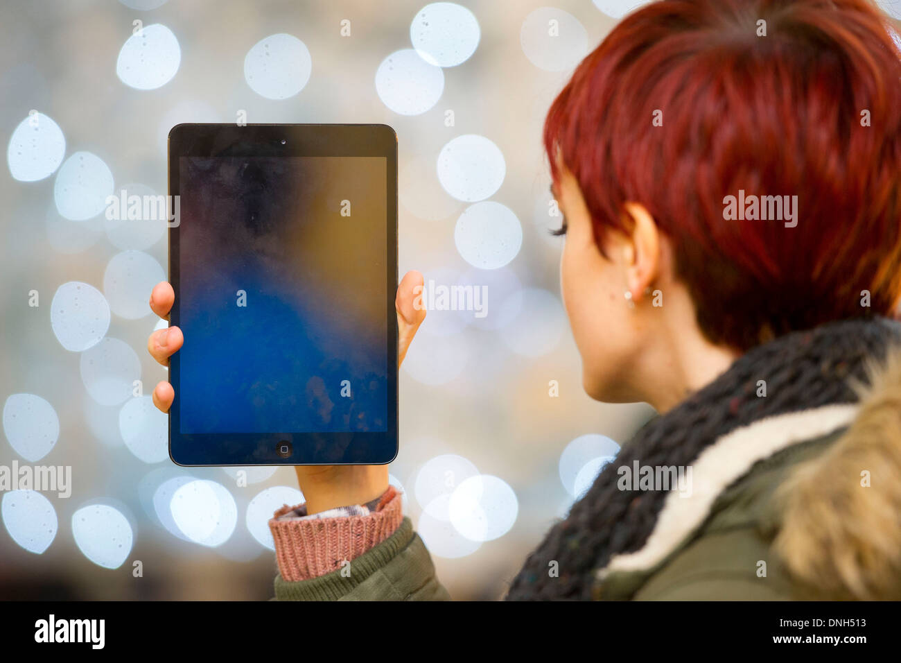 A girl holds an iPad. Stock Photo