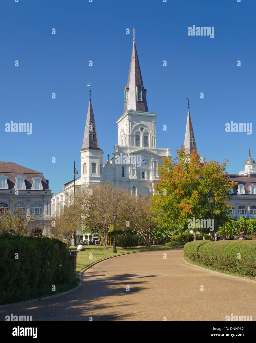View of St. Louis Cathedral, Cabildo, and Presbytere from Jackson Square Park Stock Photo
