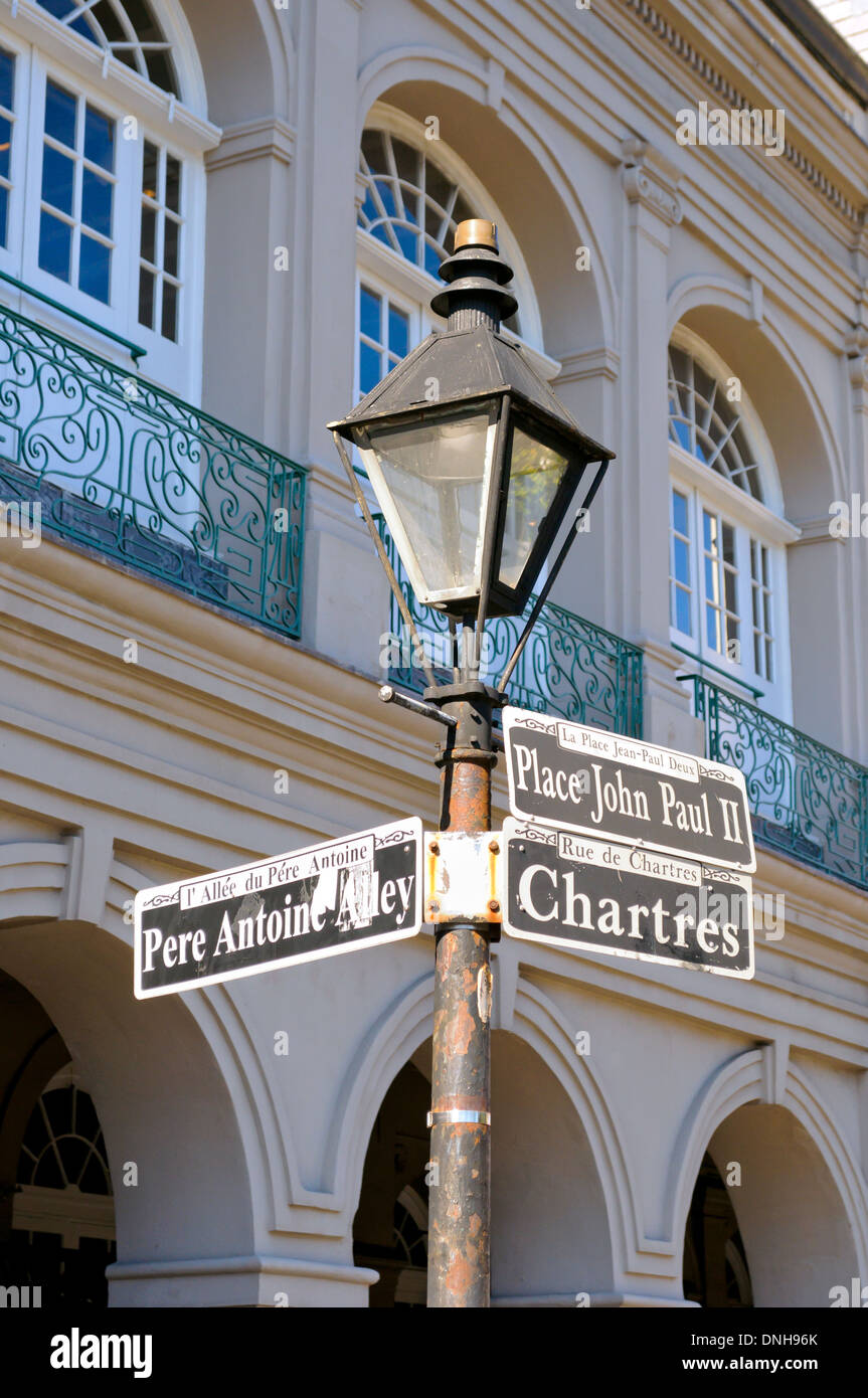 Lamp post at corner of Pere Antoine Alley and Charters St. in front of the Presbytre of the French Quarter in New Orleans Stock Photo