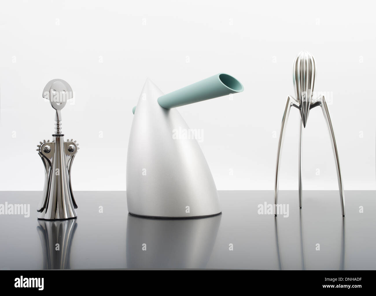 Anna G. Corkscrew, HOT BERTAA / Water Kettle, Alessi Juicy Salif Citrus Squeezer  Designed by Philippe Starck for Alessi. Stock Photo