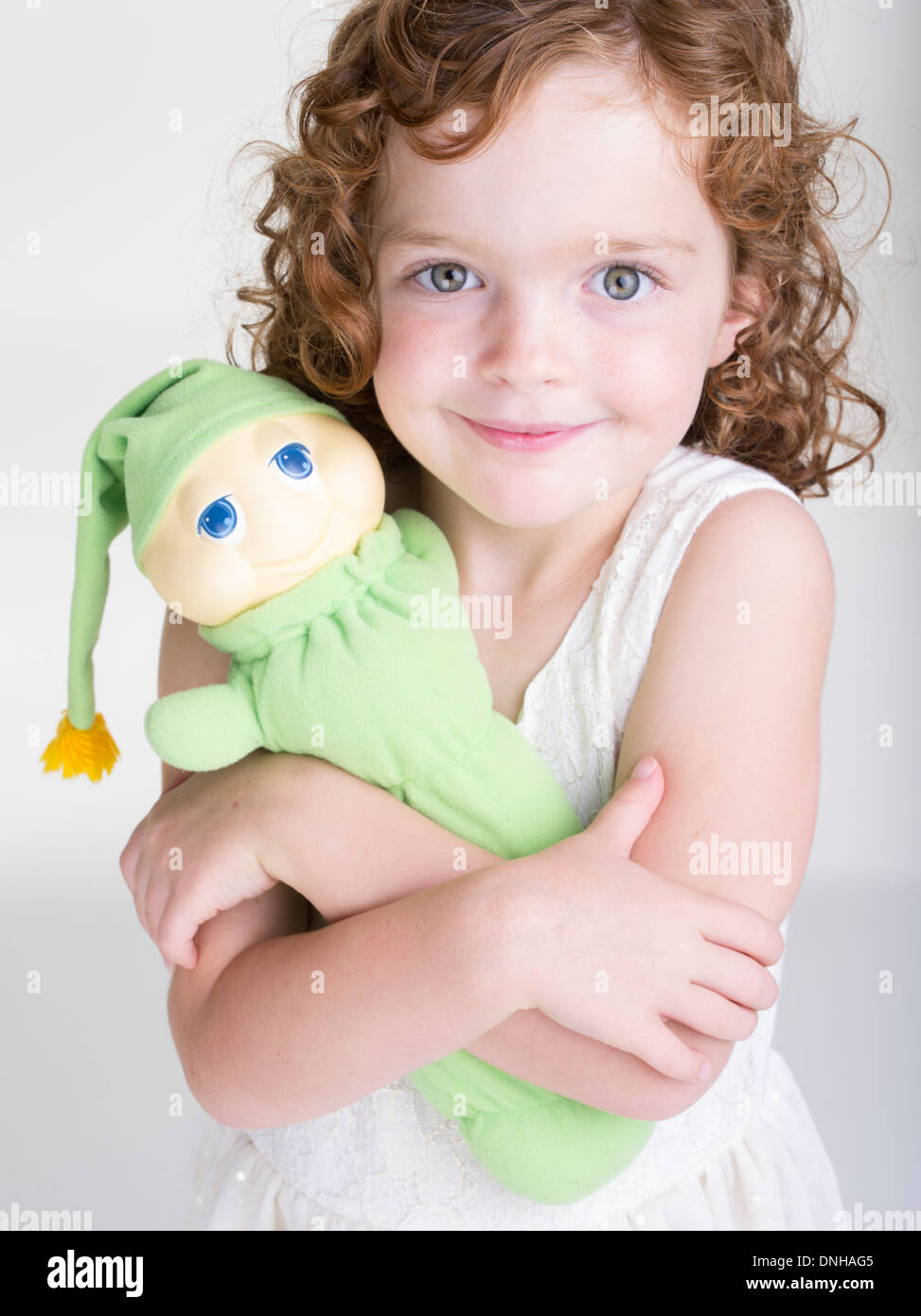 Young Girl with Glo Worm children's toy by Hasbro produced 1982 Stock Photo