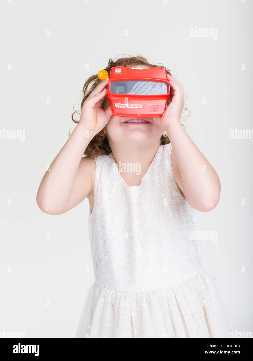 Young girl with View-Master stereoscopic 3-D 3D viewer Stock Photo
