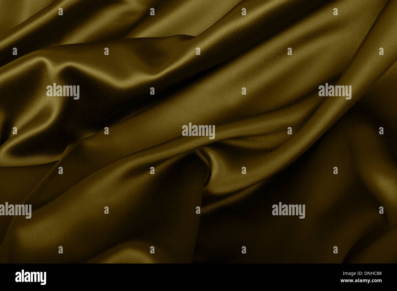 Satin Texture - Dark Golden Wavy Glossy Silk Drapery Stock Photo