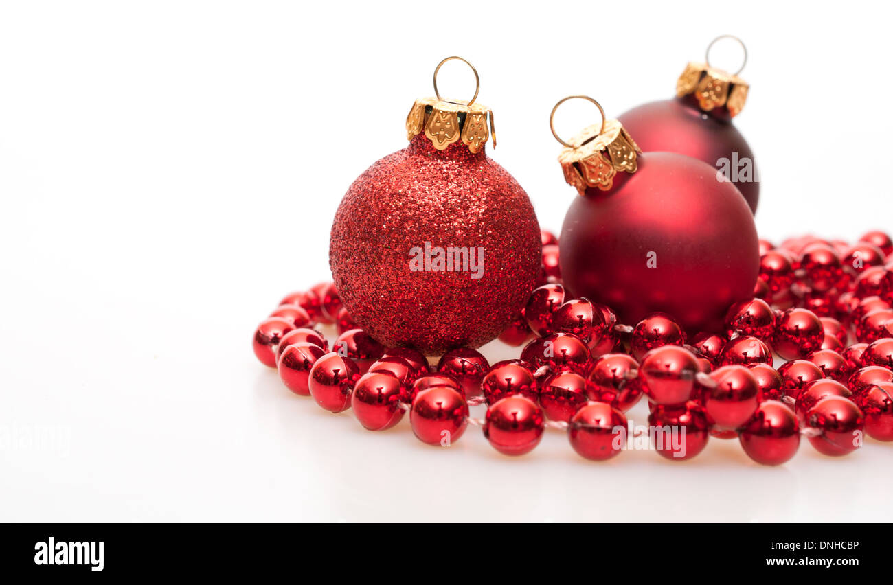Red Christmas Baubles on White Background Stock Photo