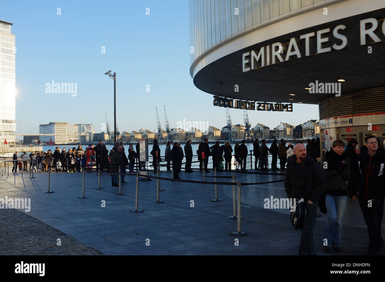 A queue at the Emirates Royal Docks terminal booking office for the Emirates Air Line Stock Photo