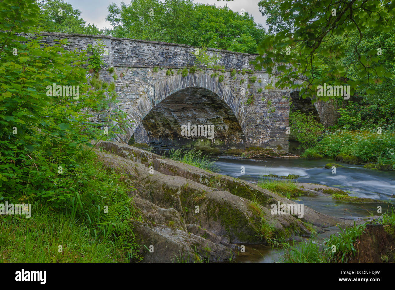The River Rothay flowing under Skelwith Bridge Stock Photo