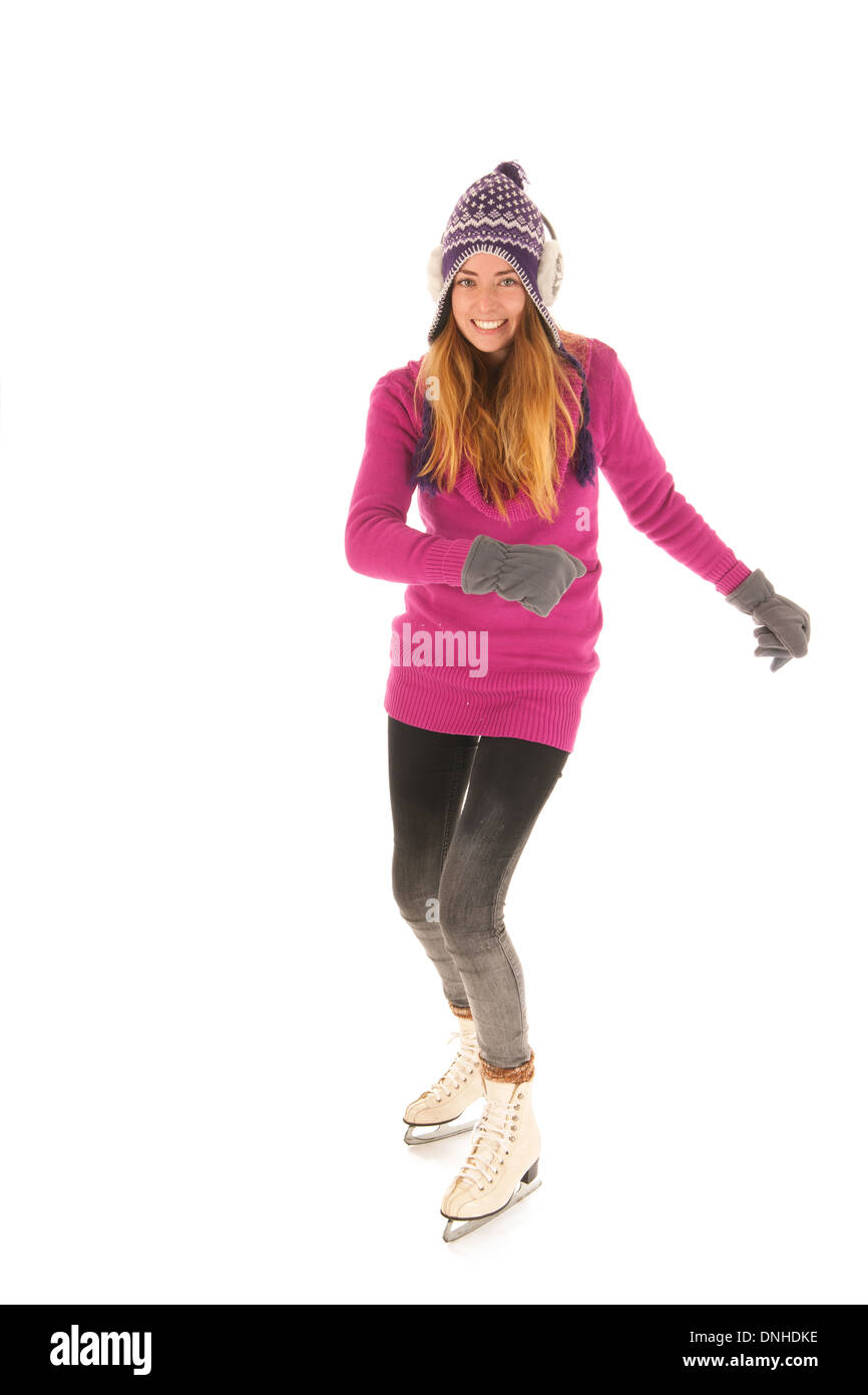 Attractive woman in pink skating on ice isolated over white background Stock Photo