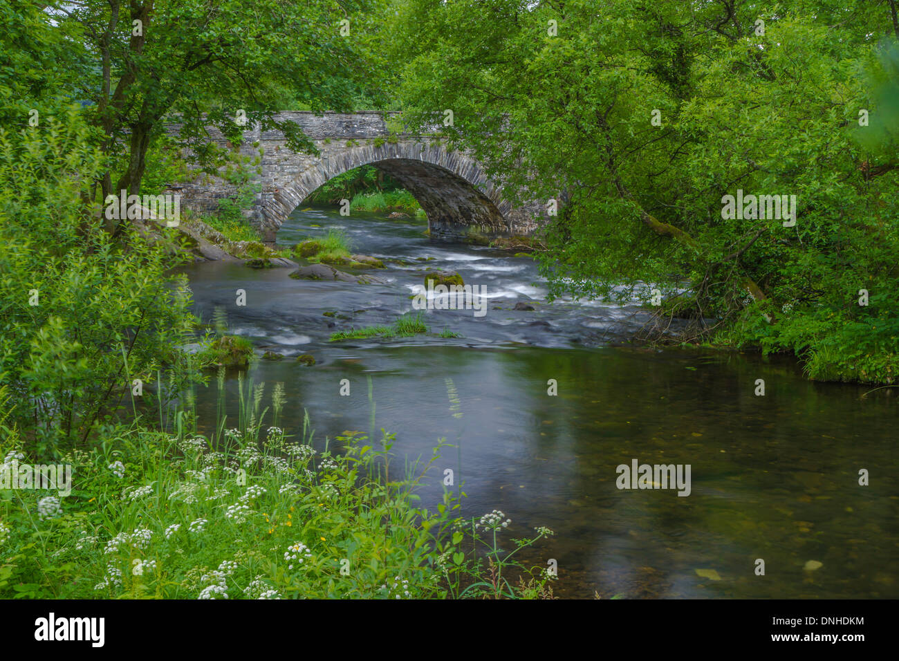 The River Rothay flowing under Skelwith Bridge Stock Photo