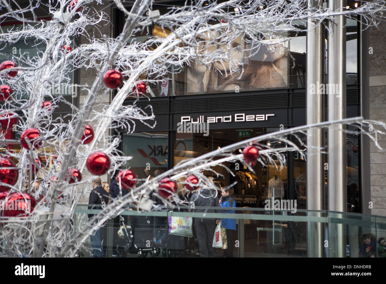 Pull & Bear Christmas shops decorations and shoppers in Liverpool One,  Merseyside, UK Stock Photo - Alamy