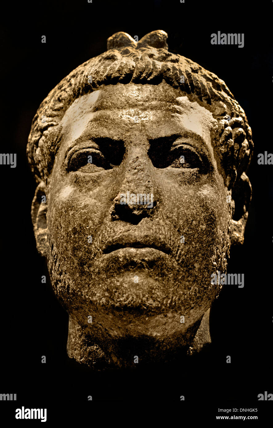 Head standing striding figure of a man wearing a lotus bud diadem 100 BC Ptolemaic Roman times Egypt Egyptian Stock Photo