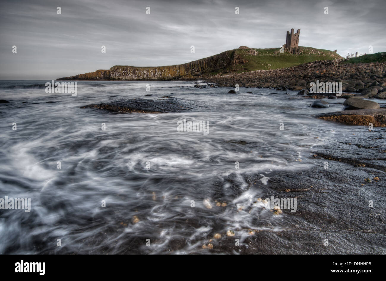 Dunstanburgh castle, Northumberland Stock Photo